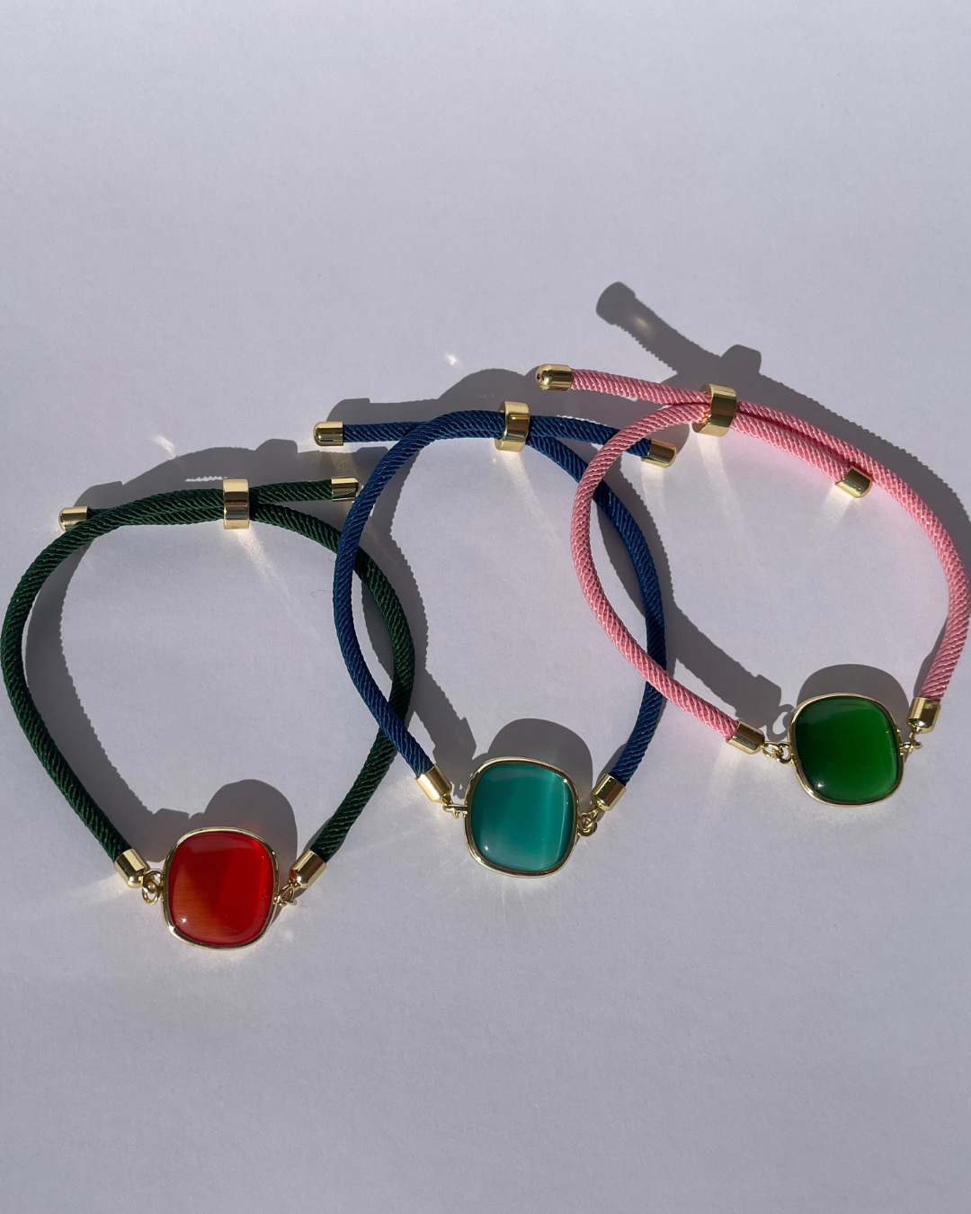 3 Pulseras - verde con naranja, azul con verde aqua y rosa con verde